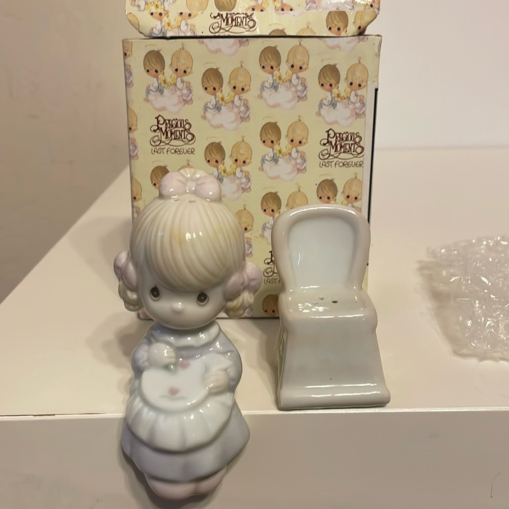Vintage Enesco precious Moments Girl in Rocker salt and Pepper shakers.